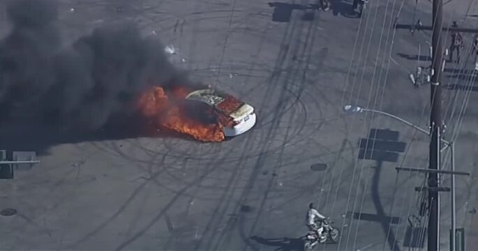 Aerial footage shows car on fire during anti-ICE protests in California