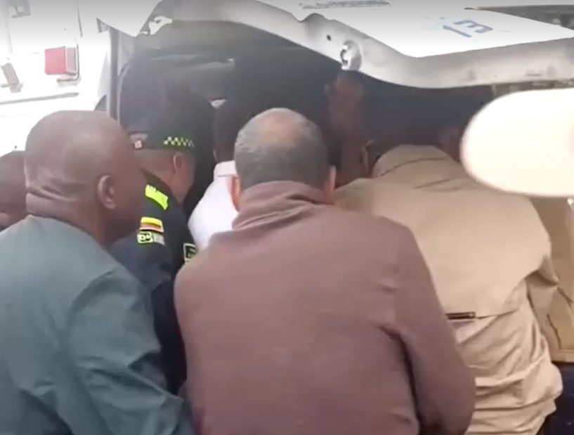 People rush Colombian Senator Miguel Uribe into ambulance after shooting