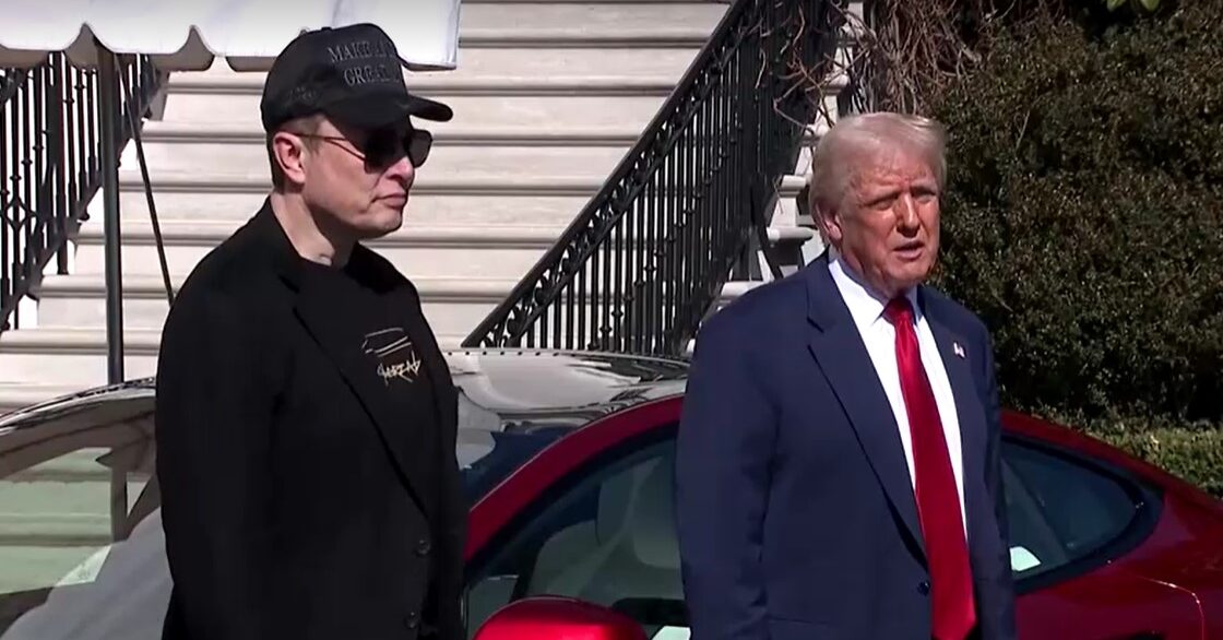 Trump and Musk stand in front of Tesla car in Washington D.C. Mar 11, 2025