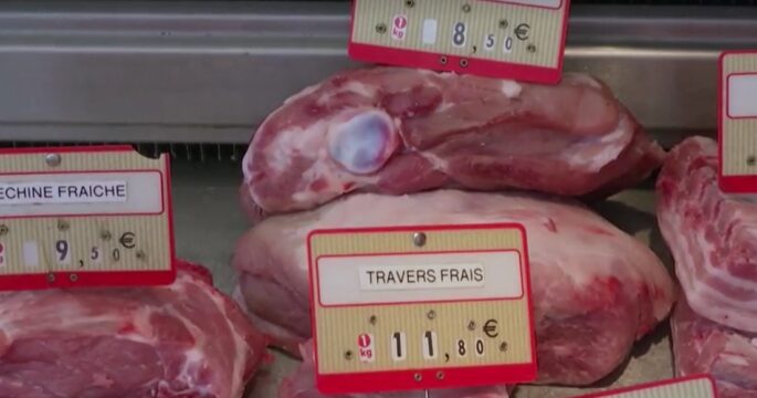 pork in market stall with price shown in euro