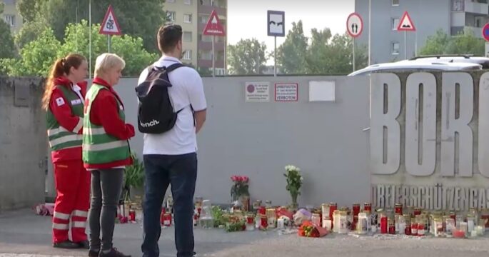 Austrians place flowers and candles at attacked school
