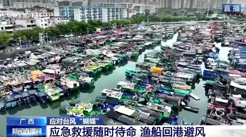 Fishing boats dock at port un China after typhoon warning from tropical storm Wutip