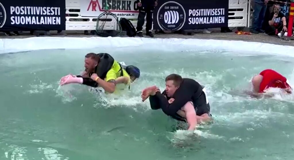 participants in Wife Carrying World Championships in Finland