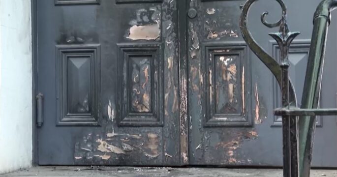 door damaged from Melbourne synagogue attack