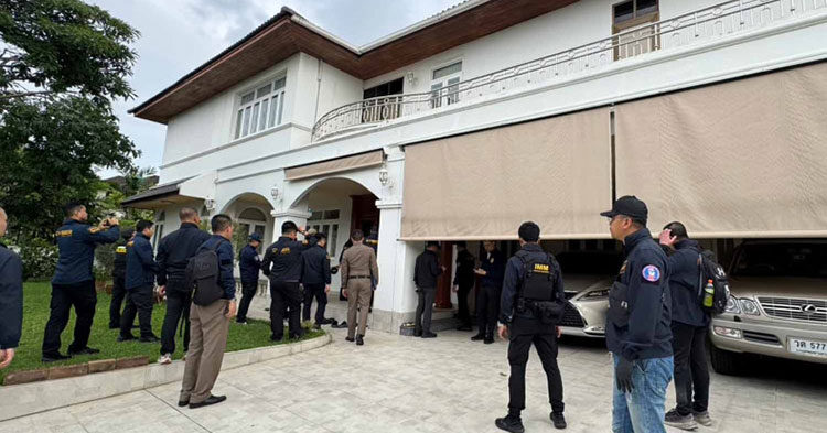 Thai police at the house of Kok An’s daughter in Bangkok