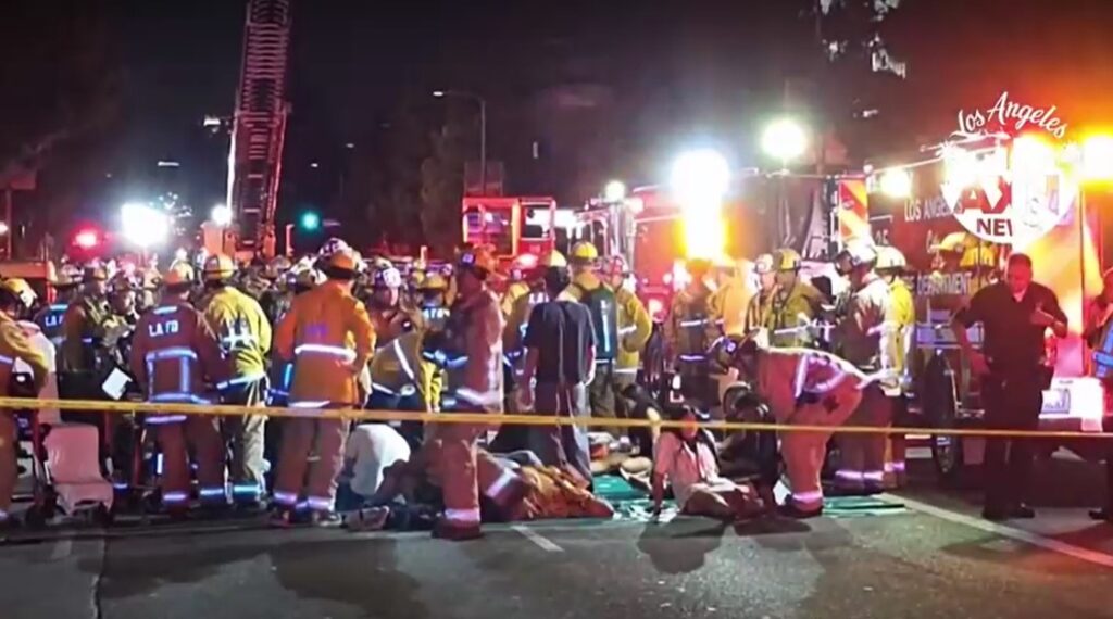 rescuers help victims from car hits crowd outside Los Angeles club