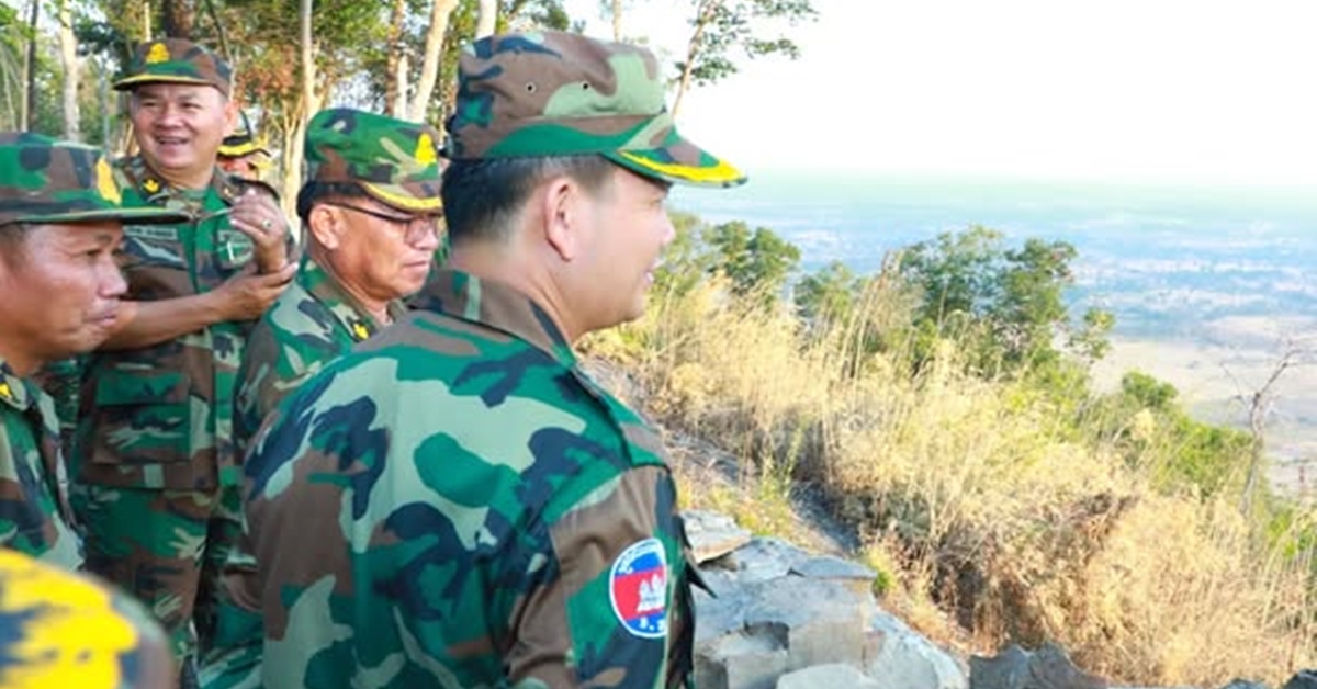 Hun Manet in camouflage uniform