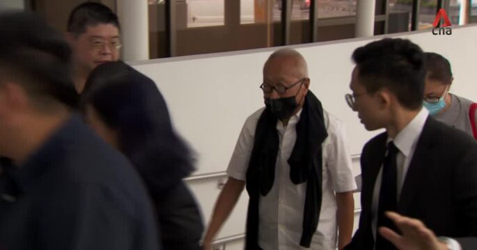 Singapore property tycoon linked to jailed minister pleads guilty