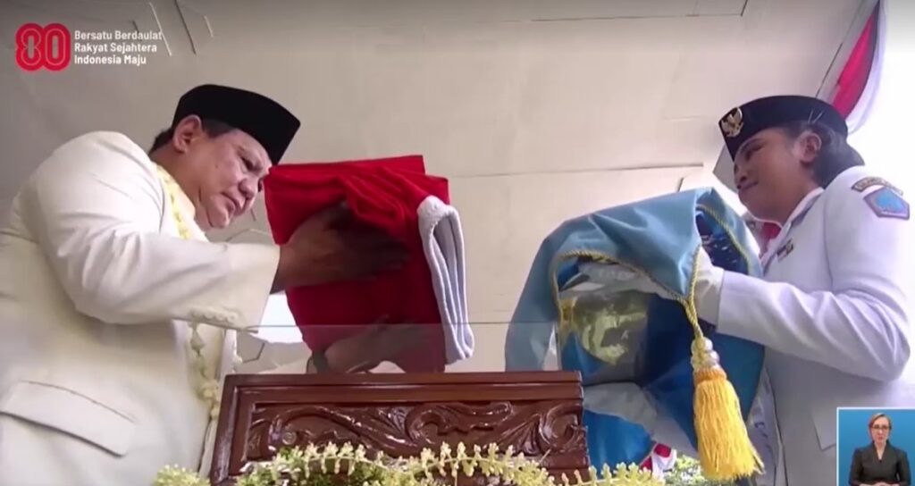 Indonesia President Prabowo gives National Flag to officer