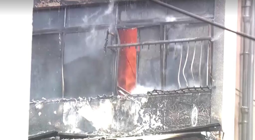 Window of building in deadly Osaka blaze