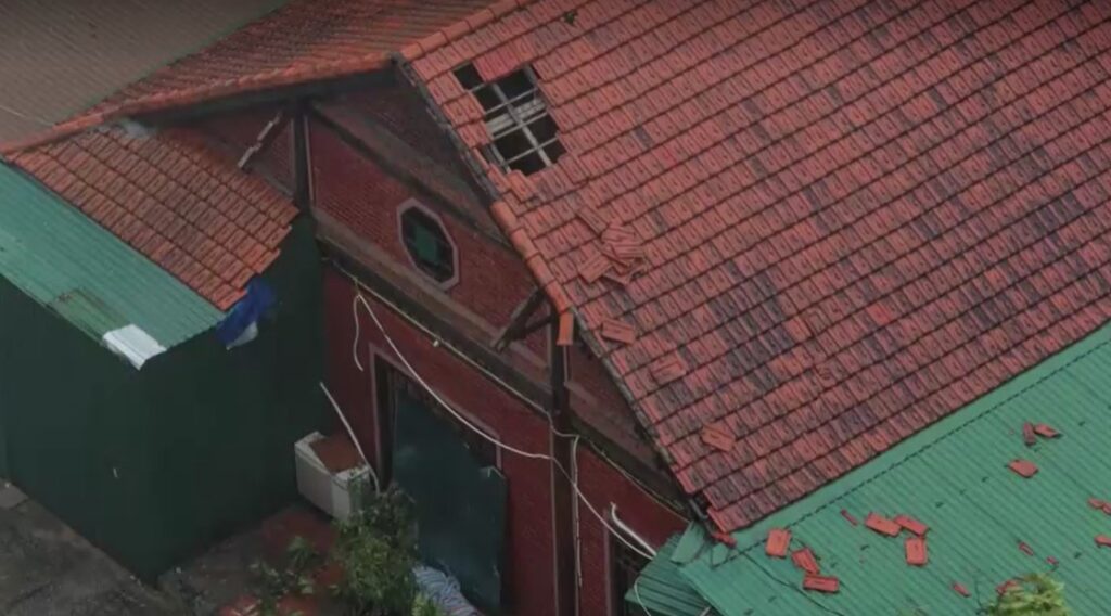 blown away roof from typhoon Kajiki lashes Vietnam