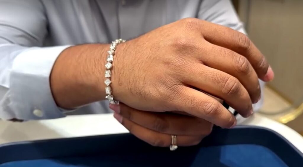 man wearing diamond bracelet