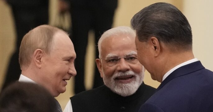 Behind the smiles with Putin, Modi and Xi at China summit