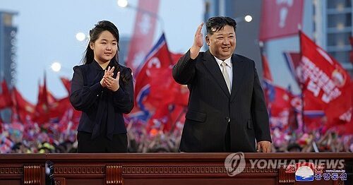 North Korean leader Kim Jong-un attends a ceremony alongside his daughter to mark the completion of a new street in Pyongyang on May 14, 2024