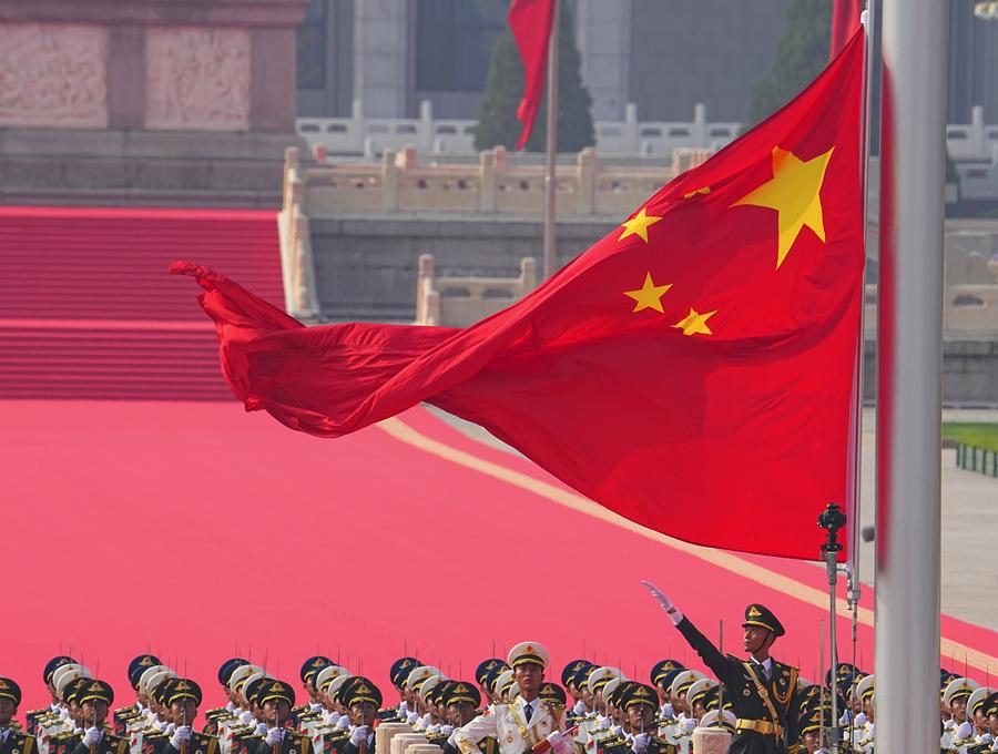 Large China flag being hoisted
