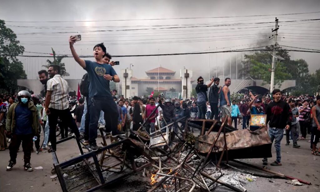 Jubilant demonstrators selfi in Kathmandu as Nepal PM Oli quits