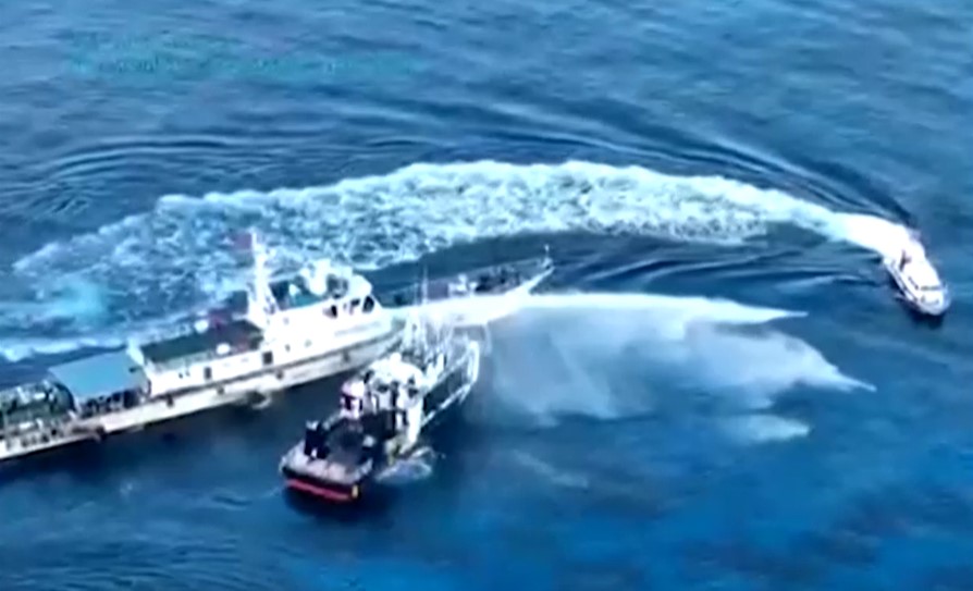 Drone footage of Chinese coast guard vessel firing water canon at Philippine vessel May 21, 2025