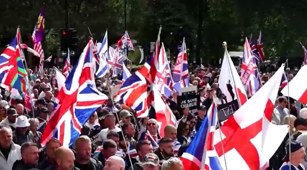 Thousands march with Union Jack and St.George flags
