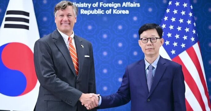 The U.S. Deputy Secretary of State Christopher Landau shakes hand with South Korea’s First Vice Foreign Minister Park Yoon-joo